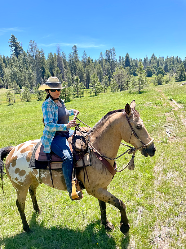 Sezen rides a horse-1